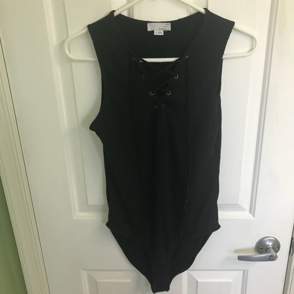 Black body suit with lace up size large